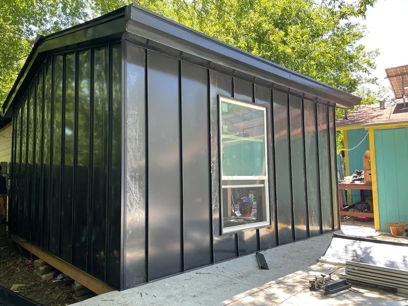 Black standing seam metal wall panels for Metal Roof Installation in Dranesville