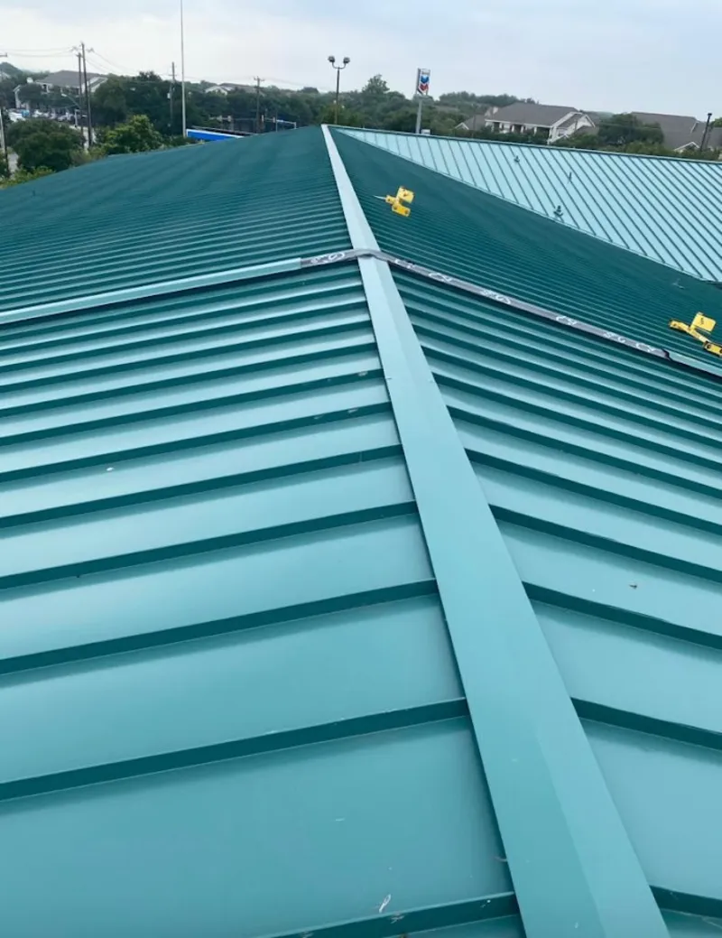 Green commercial metal roof ridge and valley for Metal Roof Repair in Dranesville